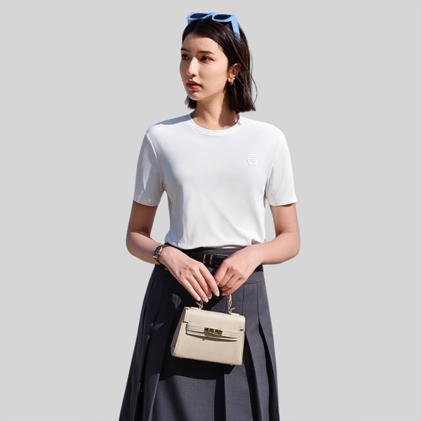 Featuring a minimalist crew neck collar and short sleeves, this versatile piece transitions effortlessly from casual wear to business-ready attire. a perfect blend of comfort, durability, and timeless style.