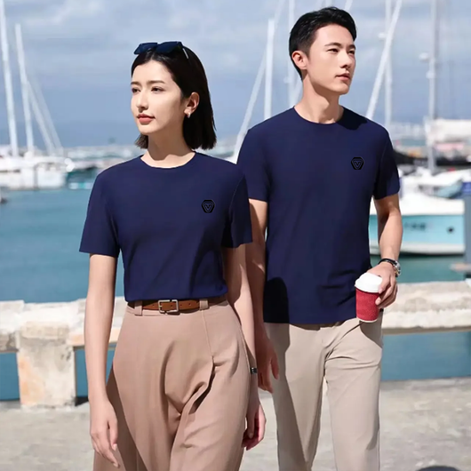 Featuring a minimalist crew neck collar and short sleeves, this versatile piece transitions effortlessly from casual wear to business-ready attire a perfect blend of comfort, durability, and timeless style.