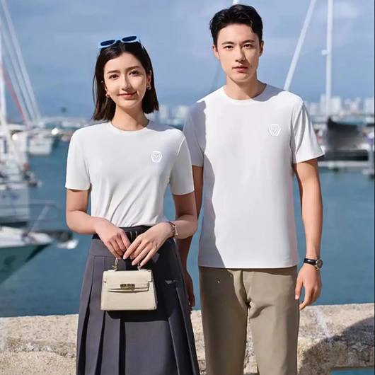 Featuring a minimalist crew neck collar and short sleeves, this versatile piece transitions effortlessly from casual wear to business-ready attire. a perfect blend of comfort, durability, and timeless style.