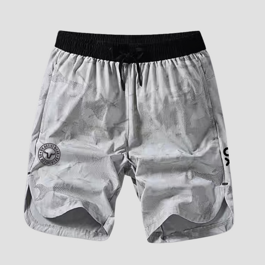 The windproof and water-resistant properties add versatility, while the anti-wrinkle and eco-friendly materials enhance durability and sustainability. With a tailored fit and Dark Grey Reflected logo, these shorts are perfect for active lifestyles.