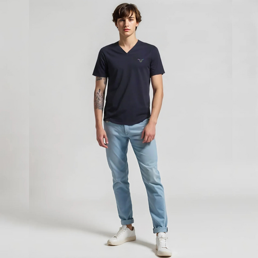 The slim-fit cut is styled with raw edge hem V-neck, rugged sleeves, and a double rugged hem round bottom style.