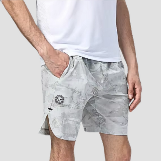 The windproof and water-resistant properties add versatility, while the anti-wrinkle and eco-friendly materials enhance durability and sustainability. With a tailored fit and Dark Grey Reflected logo, these shorts are perfect for active lifestyles.