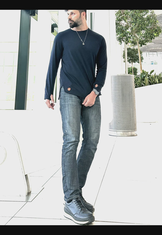 This Full Sleeve Unisex T-shirt is designed with a round front, straight back, and high side slit for a modern edge.